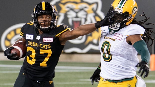 Frankie Williams stiff-arms Don Unamba, The Canadian Press Frankie Williams stiff-arms Don Unamba