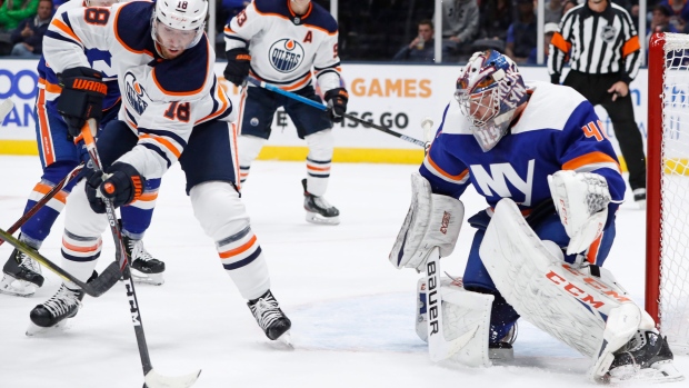 Oilers winger James Neal takes a shot Tuesday against the Islanders, The Canadian Press Oilers winger James Neal takes a shot Tuesday against the Islanders