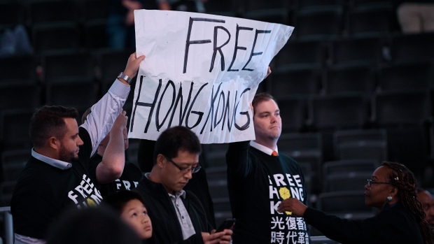 Hong Kong activist sign, The Canadian Press Hong Kong activist sign