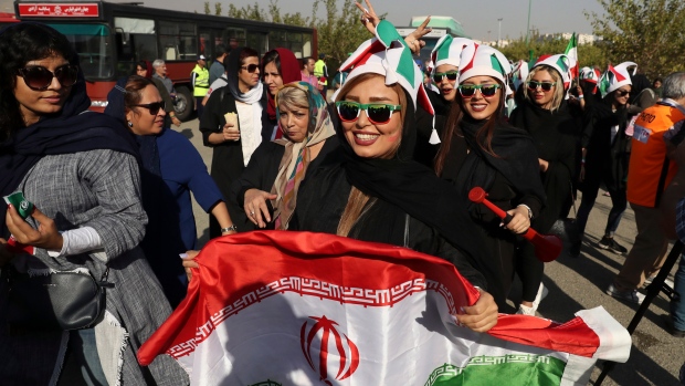 Iranian women arrive to the Azadi (Freedom) Stadium