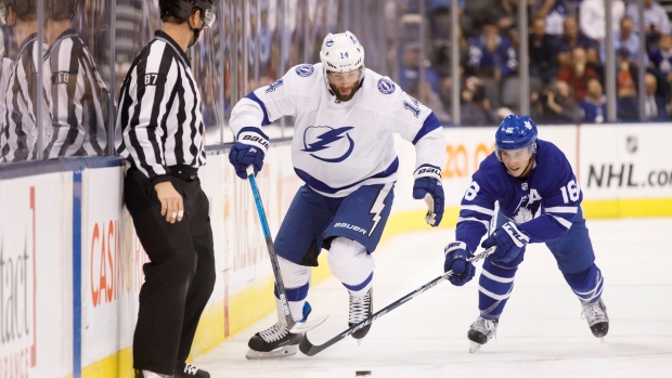 Pat Maroon and Mitch Marner battle for the puck Thursday., The Canadian Press Pat Maroon and Mitch Marner battle for the puck Thursday.