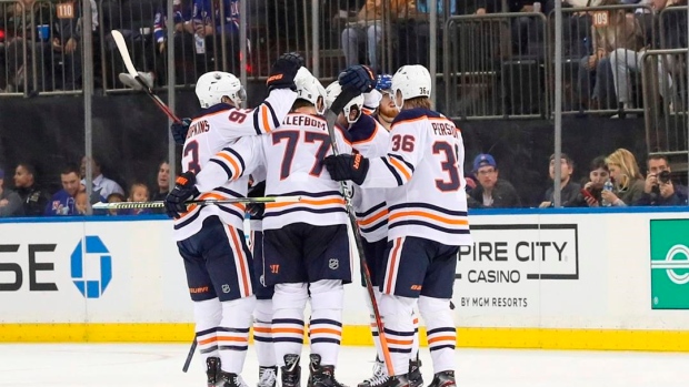 McDavid, Draisaitl help unbeaten Oilers defeat Rangers 4-1 Article Image 0, The Canadian Press McDavid, Draisaitl help unbeaten Oilers defeat Rangers 4-1 Article Image 0