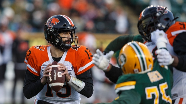 Mike Reilly (13), The Canadian Press Mike Reilly (13)