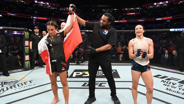 Joanna Jedrzejczyk celebrates her victory over Michelle Waterson