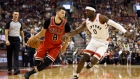 Zach LaVine (8) drives against Terence Davis