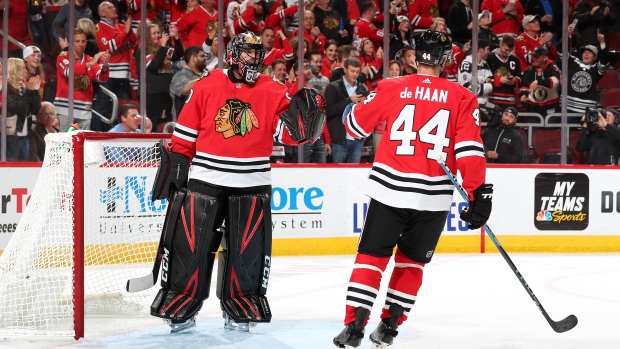 Corey Crawford and Calvin de Haan