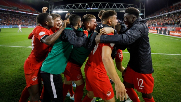 Canadian men's soccer team celebrates