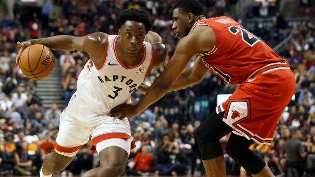 Raptors forward OG Anunoby drives against Bulls forward Thaddeus Young Sunday.