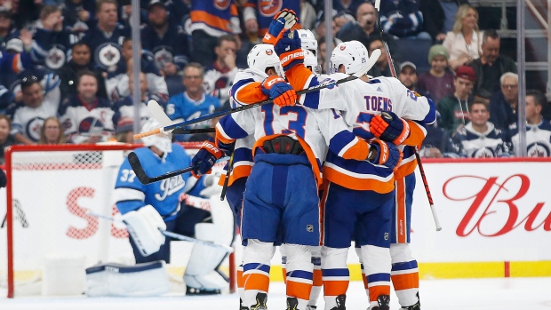 Mathew Barzal and New York Islanders Celebrate , The Canadian Press Mathew Barzal and New York Islanders Celebrate