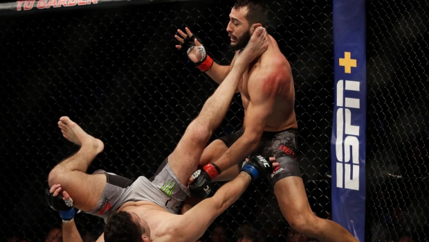 Dominick Reyes, right, takes down Chris Weldman at UFC Fight Night Friday in Boston., The Canadian Press Dominick Reyes, right, takes down Chris Weldman at UFC Fight Night Friday in Boston.