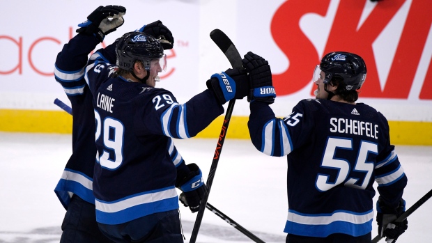 Patrik Laine Mark Scheifele, The Canadian Press Patrik Laine Mark Scheifele