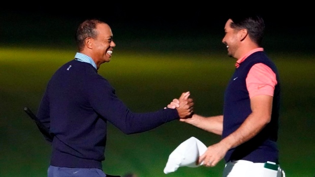 Tiger Woods and Jason Day, The Canadian Press Tiger Woods and Jason Day