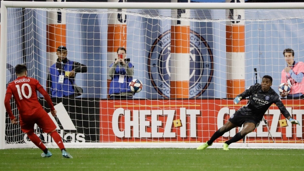 Alejandro Pozuelo converts a penalty kick on 'keeper Sean Johnson Wednesday in New York., The Canadian Press Alejandro Pozuelo converts a penalty kick on 'keeper Sean Johnson Wednesday in New York.