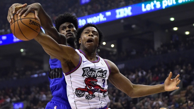 old school purple raptors jersey