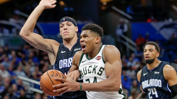 Giannis Antetokounmpo, Milwaukee Bucks roll past Orlando Magic ...