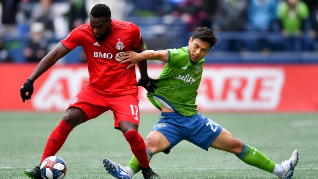 Jozy Altidore and Kim Kee-Hee