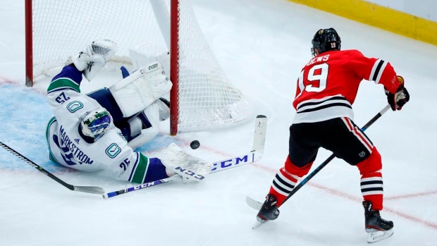 Kane has goal and 2 assists, Blackhawks beat Canucks 5-2 Article Image 0, The Canadian Press Kane has goal and 2 assists, Blackhawks beat Canucks 5-2 Article Image 0