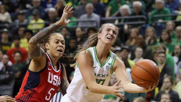Sabrina Ionescu, right, goes up for a shot ahead of United States' Seimone Augustus, The Canadian Press Sabrina Ionescu, right, goes up for a shot ahead of United States' Seimone Augustus