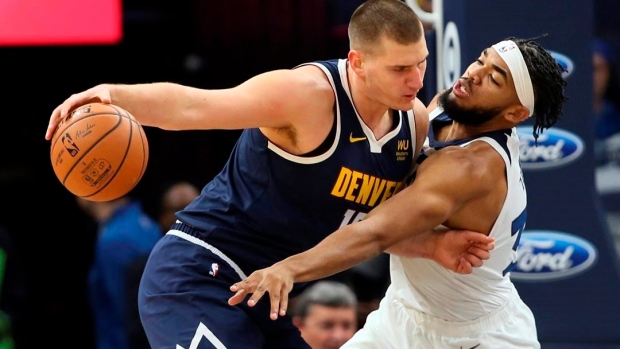 Jokic, Nuggets hold on for 100-98 overtime win over Wolves Article Image 0, The Canadian Press Jokic, Nuggets hold on for 100-98 overtime win over Wolves Article Image 0