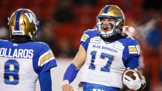 Chris Streveler, right, celebrates his touchdown with teammate Zach Collaros