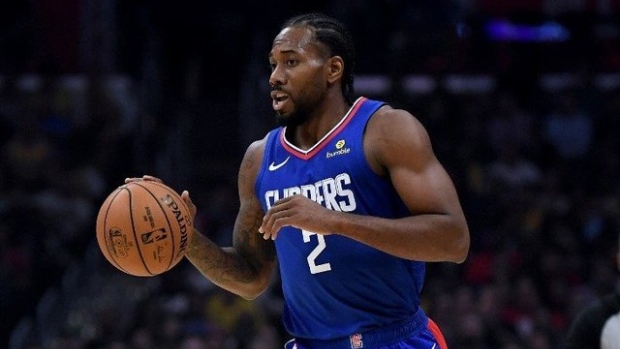 Kawhi Leonard , Harry How/Getty Images/AFP Kawhi Leonard