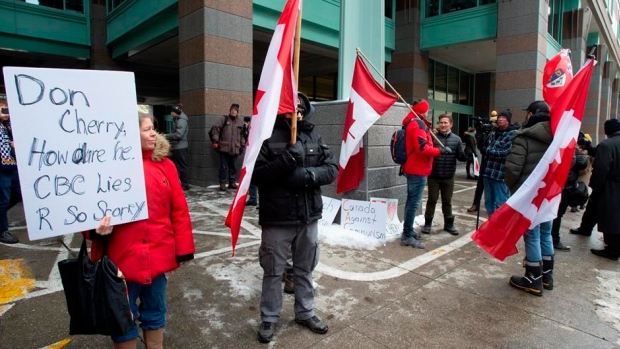 Small group of Cherry supporters protest his firing outside Rogers headquarters