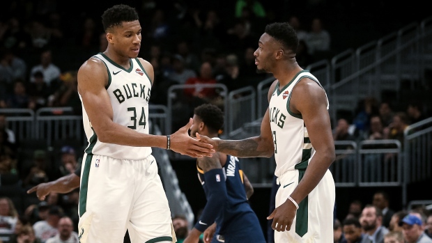 Giannis Antetokounmpo #34 and Thanasis Antetokounmpo #43 , Dylan Buell/Getty Images Giannis Antetokounmpo #34 and Thanasis Antetokounmpo #43