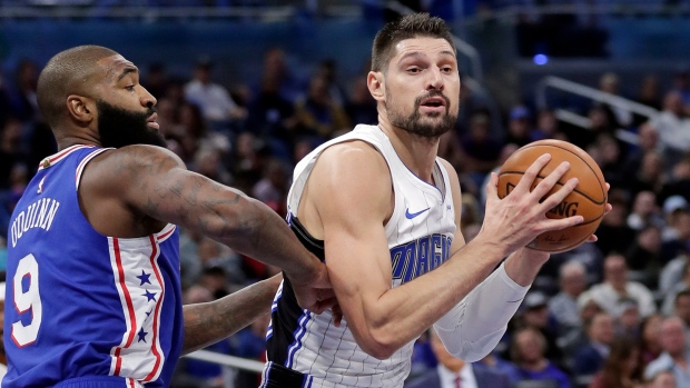 Nikola Vucevic, right, and Kyle O'Quinn