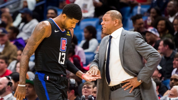 Paul George and Doc Rivers