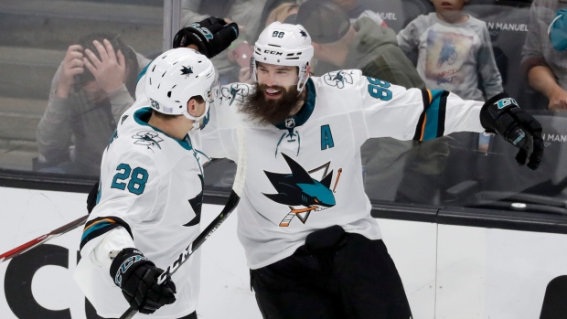 Brent Burns and Timo Meier