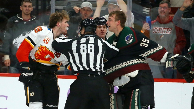 Matthew Tkachuk and Darcy Kuemper