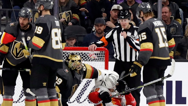 Marc-Andre Fleury and Matthew Tkachuk, The Canadian Press Marc-Andre Fleury and Matthew Tkachuk