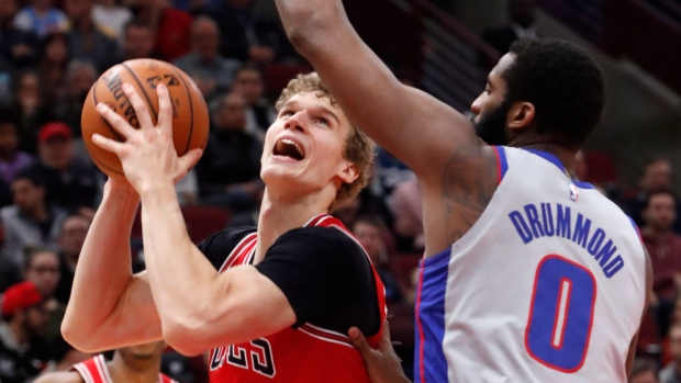 Lauri Markkanen Andre Drummond, The Canadian Press Lauri Markkanen Andre Drummond