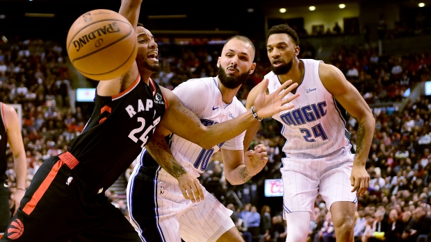 Norman Powell Evan Fournier Khem Birch, The Canadian Press Norman Powell Evan Fournier Khem Birch
