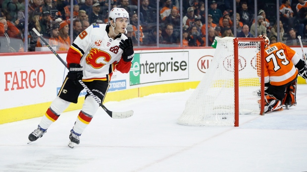 Matthew Tkachuk (19) reacts after scoring a goal against Carter Hart (79)