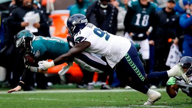 Carson Wentz Jarran Reed, The Canadian Press Carson Wentz Jarran Reed