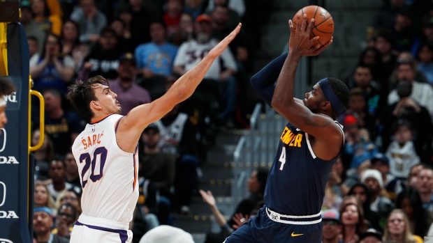 Dario Saric Paul Millsap, The Canadian Press Dario Saric Paul Millsap