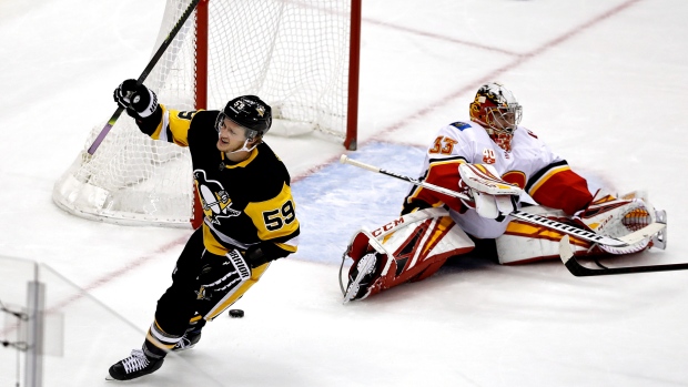 Jake Guentzel David Rittich, The Canadian Press Jake Guentzel David Rittich
