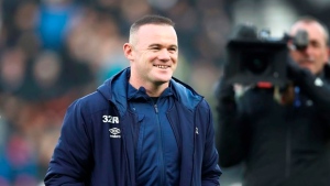 Rooney says he rejected Everton interest