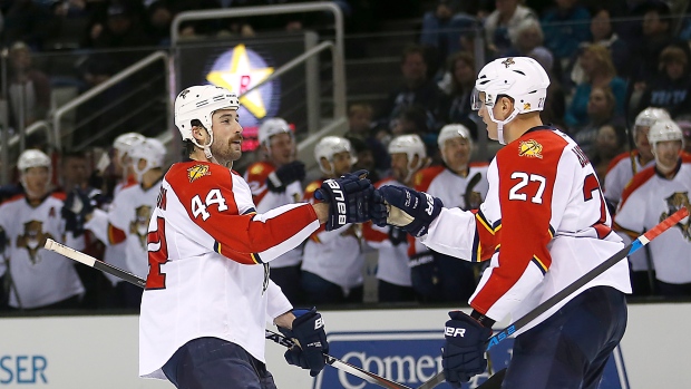 Bjugstad and Gudbranson celebrate, The Canadian Press Bjugstad and Gudbranson celebrate