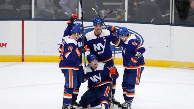 Josh Bailey Anders Lee Mathew Barzal Ryan Pulock, The Canadian Press Josh Bailey Anders Lee Mathew Barzal Ryan Pulock
