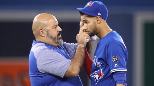 Jose Ministral and Lourdes Gurriel Jr. , Tom Szczerbowski/Getty Images Jose Ministral and Lourdes Gurriel Jr.