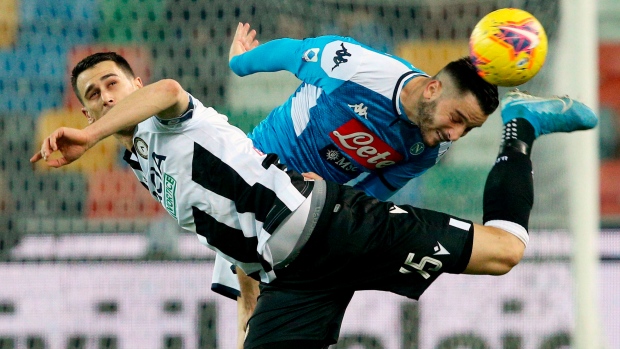 Udinese's Kevin Lasagna and Napoli's Konstantinos Manolas