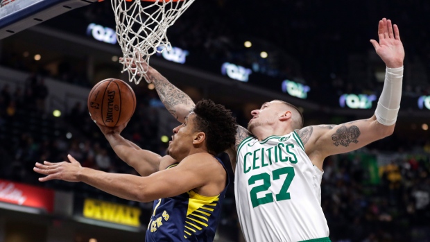 Malcolm Brogdon Daniel Theis, The Canadian Press Malcolm Brogdon Daniel Theis