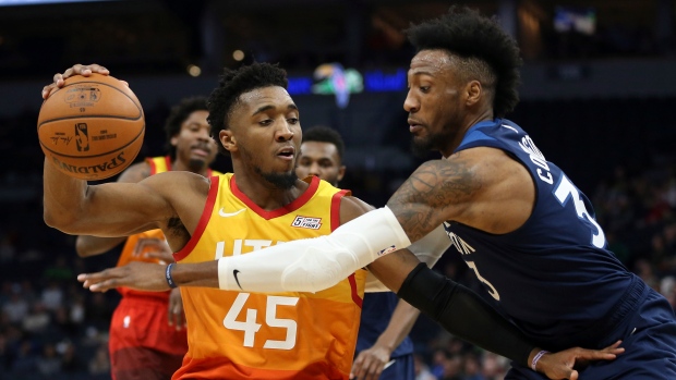 Donovan Mitchell Robert Covington, The Canadian Press Donovan Mitchell Robert Covington