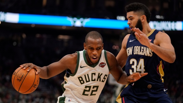 Khris Middleton, Kenrich Williams , The Canadian Press Khris Middleton, Kenrich Williams