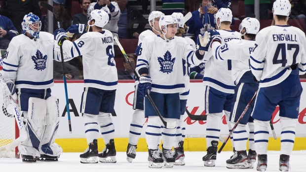Leafs goalie Frederik Andersen and his teammates celebrate Tuesday's win against the Canucks., The Canadian Press Leafs goalie Frederik Andersen and his teammates celebrate Tuesday's win against the Canucks.
