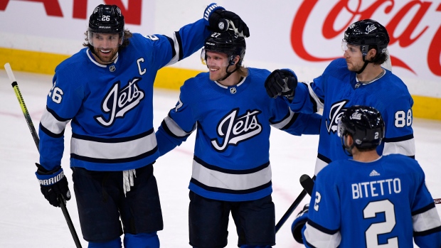 Winnipeg Jets celebrate, The Canadian Press Winnipeg Jets celebrate