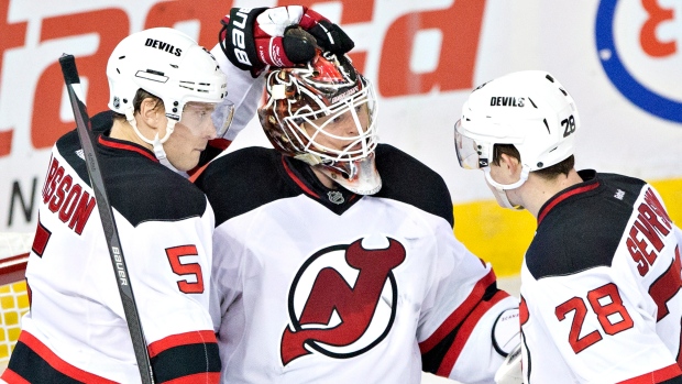 Cory Schneider and Devils Celebrate, The Canadian Press Cory Schneider and Devils Celebrate