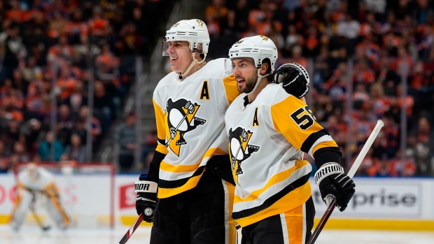 Kris Letang and Evgeni Malkin